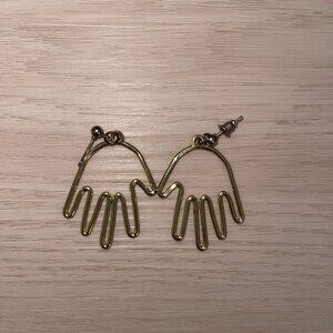 Hand gold earrings